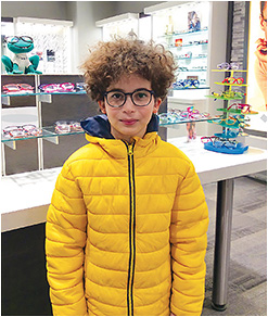Figure 2. Youth patient in the myopia academy program at our practice wearing spectacles for myopia control. Image courtesy of Sheila Morrison, OD