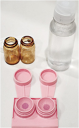 Figure 1. Shake lenses to remove from transport vials and transfer to a new lens case with fresh multipurpose solution prior to dispensing a new lens pair.